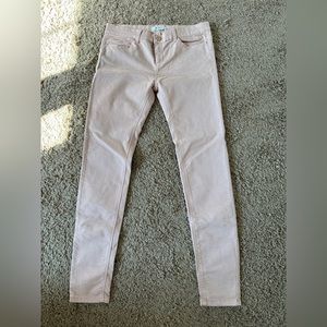 Stradivarius mid-rise pink nude colored women’s jeans.